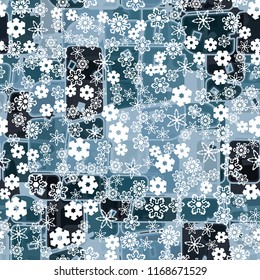 Abstract seamless pattern of ice colors on a background of a variety of snowflakes.