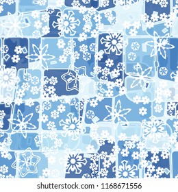 Abstract seamless pattern of ice colors on a background of various snowflakes of different sizes.