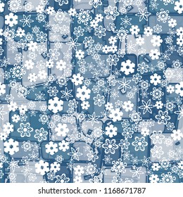 Abstract seamless pattern of ice colors on a background of a variety of snowflakes.