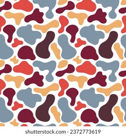Abstract seamless pattern, imitation of animal skin print with gray, brown, yellow and red spots on a white background. Vector illustration. For wrapping, backgrounds, textile.   