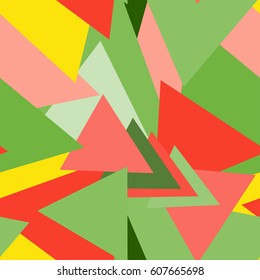Abstract seamless pattern with intersected green, yellow and red triangles. Bright multicolored geometric minimalist illustration.