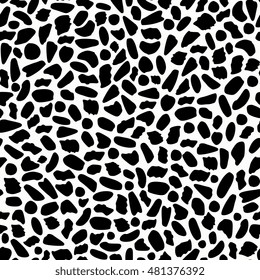 Abstract seamless pattern with irregular shapes in black and white.