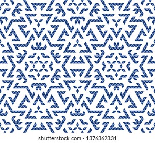 Abstract seamless pattern with kaleidoscope. Symmetric patterns of reflections of figures.