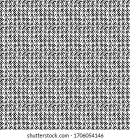 Abstract seamless pattern of little black crosses and dots. Hand drawn fabric texture
