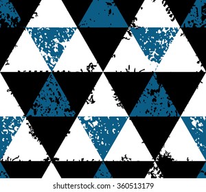 Abstract seamless pattern made from grunge triangles