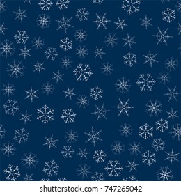 abstract seamless pattern made of snowflakes on blue. Christmas background for design of posters, postcards, invitation for the new year. Vector illustration.