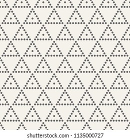 Abstract seamless pattern. Modern stylish texture. Repeating geometric tiles with dotted triangles. Simple minimalistic vector background. Small circles form triangular minimalistic ornament.