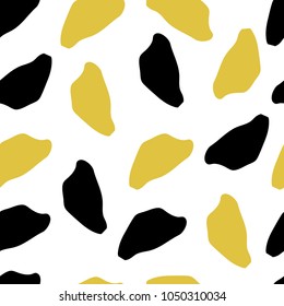 Abstract seamless pattern. Modern wallpaper in trendy colors. Golden and black. Background texture with blots. 