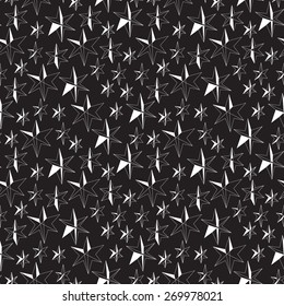 Abstract seamless pattern of objects in the form of stars in black and white colors
