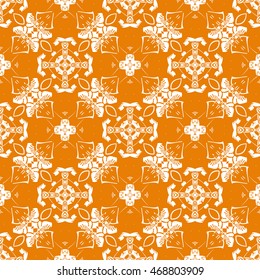 Abstract seamless pattern of orange color for wallpapers and background.