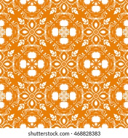 Abstract seamless pattern of orange color for wallpapers and background.