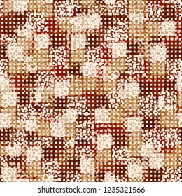 Abstract seamless pattern painted in colors of autumn gold. Rows of small squares foreground.