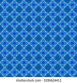 Abstract seamless pattern of a plurality stylized elements in white and blue colors. Vector textured background.