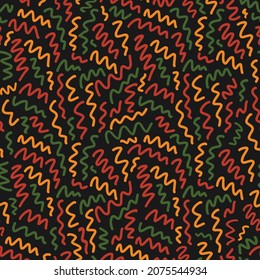 Abstract seamless pattern with random hand drawn scribbles doodle lines in traditional African colors - red, yellow, green on black background. backdrop for Kwanzaa, Black History Month, Juneteenth