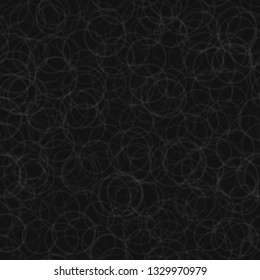 Abstract seamless pattern of randomly arranged contours of circles in black and gray colors