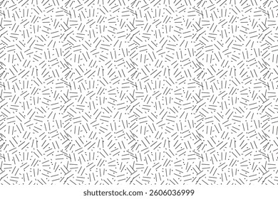 Abstract seamless pattern with randomly arranged short lines. Modern, minimalistic, and geometric texture for backgrounds and designs.
