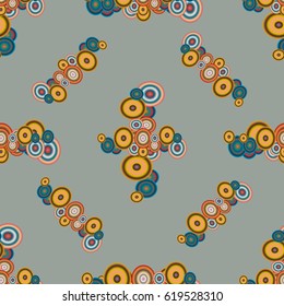 Abstract seamless pattern with randomly bright colored overlapping circles, dots. Abstract background with little circles for your business artwork.