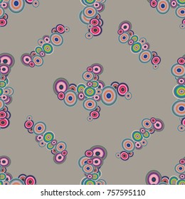 Abstract seamless pattern with randomly bright colored overlapping circles, dots. Abstract background with little circles for your business artwork.