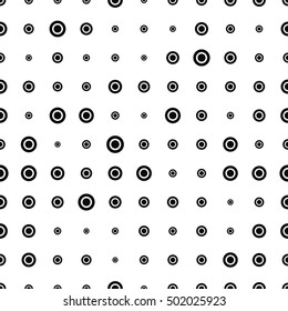 Abstract seamless pattern with randomly dots. Background with circles. Seamless background texture. Halftone dots chaotic pattern, fabric print. Polka dot. Round seamless pattern. Vector illustration.