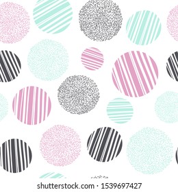 Abstract seamless pattern with scratched circles of different sizes. Vector illustration with natural tune for wrapping paper, textile, cover. Mint green, pink and grey doodles on white background