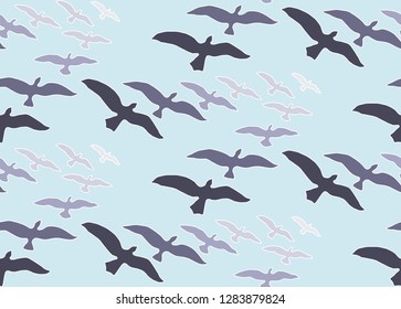 Abstract seamless pattern with silhouettes of birds - a flock of birds in the sky