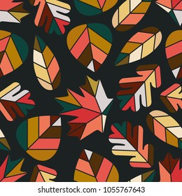 Abstract seamless pattern with simple geometrical oak, beech, maple and birch leaves placed randomly. Soft autumn colors.