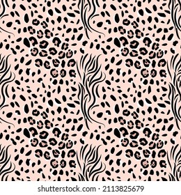 Abstract seamless pattern from a simplified drawing of the skin of leopard and wild animals. black spots of brush strokes on pink background. Simple modern fashion print