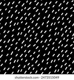 Abstract seamless pattern with small white lines. Vector illustration of specks. Black and white background with randomly located asymmetric spots. Texture with cartoon rain or snow