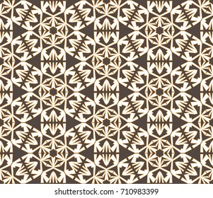 Abstract seamless pattern with snowflakes and elements of kaleidoscope