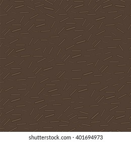 Abstract seamless pattern with specks on the brown background