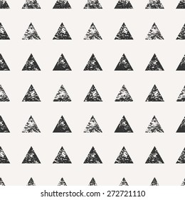 Abstract seamless pattern with stamped triangular shapes. Hand drawn watercolor geometric pattern.