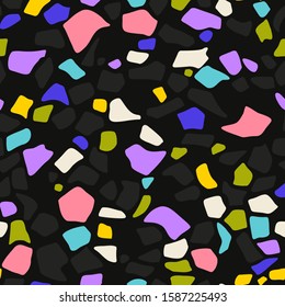Abstract seamless pattern in terrazzo style. Vector background. Colorful print for wallpaper, backdrop, fabric, etc. Gray, blue, green and pink colors on dark background