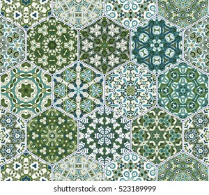 Abstract seamless pattern tiles. Colorful vector set of hexagonal elements for design of wallpaper, fabric or wrapping paper.