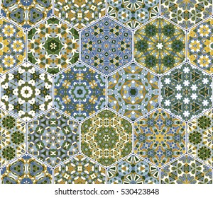 Abstract seamless pattern tiles. Colorful vector set of hexagonal elements for design of wallpaper, fabric or wrapping paper.