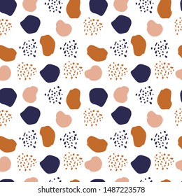 Abstract seamless pattern. Trendy wallpaper with random different shapes in warm earthy colors. Brown, beige, dark blue, pastel. Modern textile, branding and packaging,wrapping paper.