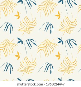 Abstract seamless pattern. Trendy wallpaper with hand drawn tropical leaves in warm earthy colours. Yellow, blue. Modern textile, branding.