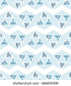 Abstract seamless pattern of triangles. Shades of blue.