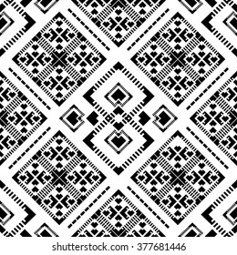 Abstract seamless pattern with tribal aztec design. Hipster boho chic style. Black and white.