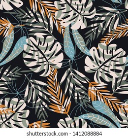 Abstract seamless pattern with tropical leaves on a dark background. Vector design. Jungle print. Textiles and printing.