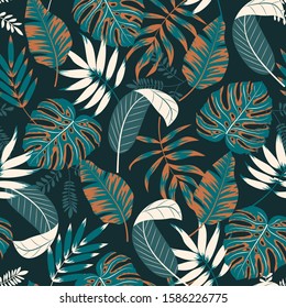 Abstract seamless pattern with tropical plants and leaves on a dark background. Vector background for various surface.  Jungle leaves. Botanical pattern. Exotic wallpaper. Hand draw texture. 