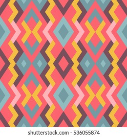 Abstract seamless pattern. Vector geometric background of triangles in pink, yellow, violet and blue colors. Mosaic texture for textile, clown, carpeting, warp, book cover, clothes