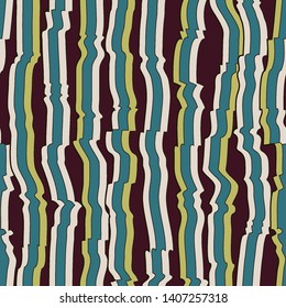 Abstract seamless pattern with vertical curved lines. Background with uneven parallel stripes. Ornament in yellow and red colors.