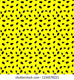 Abstract seamless pattern from watermelon seeds on yellow background. Vector pattern from natural objects. Template for cover, fabric.