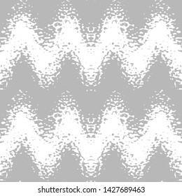 Abstract seamless pattern of waves and spots. Image in grunge style. Optical illusion of space distortion.