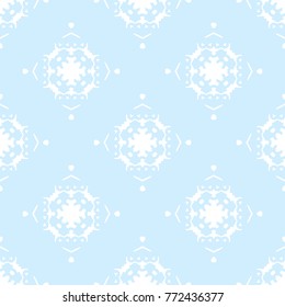 Abstract seamless pattern for your winter design. Christmas Ornamental Decor Background. Winter Holiday Snowflakes lacy tile ornament. Christmas Ornamental Decor Background. 