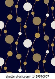 Abstract seamless print with gold and white balls, vertical dotted lines on a dark blue background. Elegant unusual pattern in vintage style. Vector illustration. Luxurious design.