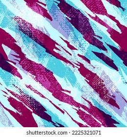 Abstract seamless sport grunge pattern with brush track. Colorful grungy textured repeated print for sport textile, boy clothes, wrapping paper. Camouflage burgundy and blue repeat ornament.