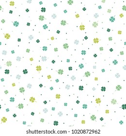 An abstract seamless springtime pattern with four-leaf clovers, vector illustration.