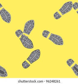 Abstract seamless texture with footprints. Vector drawing EPS 10.