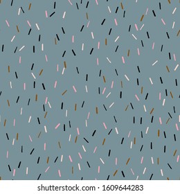 Abstract seamless texture with small hand drawn lines. Vector cute and simple confetti pattern. Chaotic lines background.